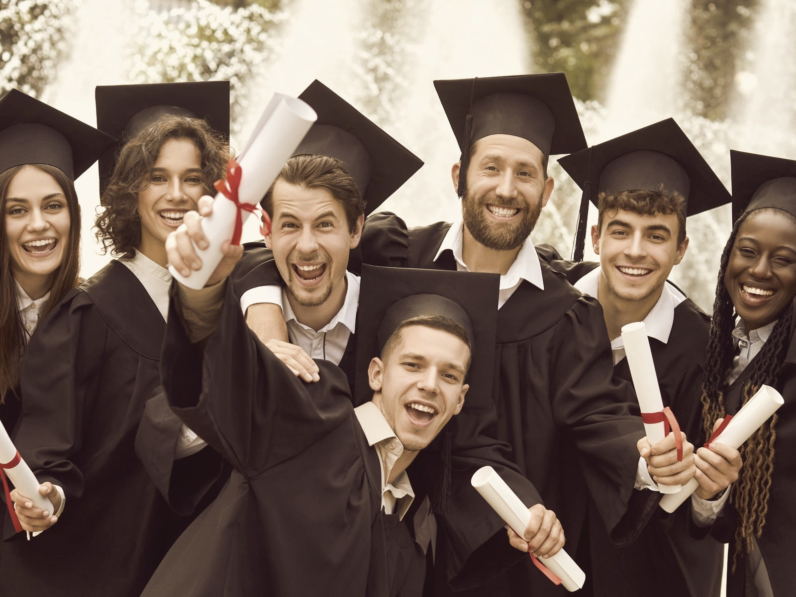 Graduates with their diplomas, recognition of academic qualifications